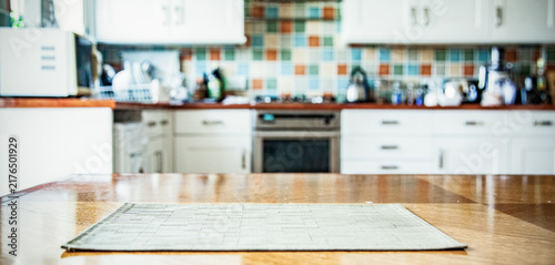 Obraz na płótnie blurred kitchen interior with napkin on table