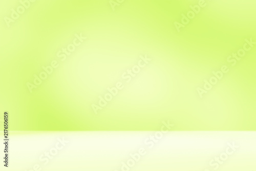 Empty green room studio with sunlight effect shadow. Minimal background for product presentation. Autumn backdrop. Cosmetic and beauty products display room.