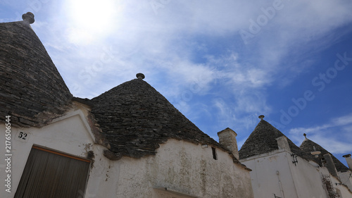 Foto Trullo Roof Detail Against Clear Blue Sky in Alberobello