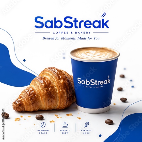 SabStreak coffee and bakery branding, blue takeaway coffee cup with latte art, fresh buttery croissant and roasted beans on white background