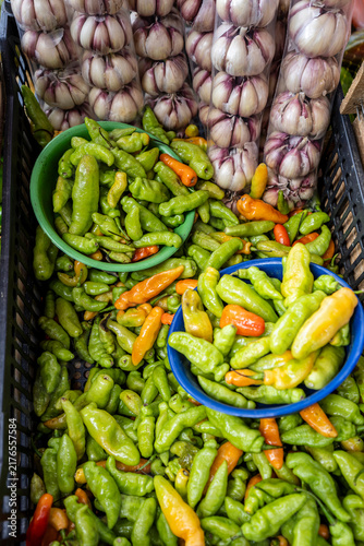 Fotografie Aromatic chili pepper and garlic on display on street market stall in Sao Paulo,