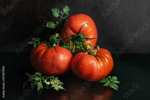 red tomatoes on a wooden table