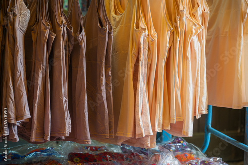 Fotografie Row of women sleeveless undershirts and camisoles hanging neatly for sale at a traditional local market in South Korea