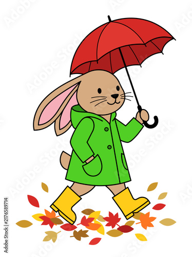 Cartoon rabbit walking with red umbrella in autumn leaves  