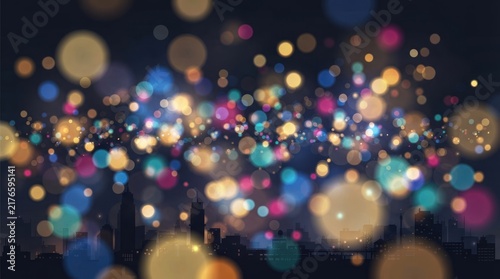 Abstract background with colorful glowing blur circles at night.