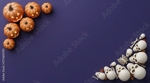 Top view of glowing halloween pumpkins and human skulls arranged on a dark purple background