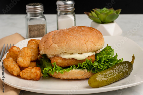 Bild auf Leinwand haddock   fillet sandwich served with tater tots