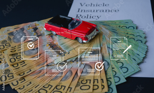 Vehicle or Car insurance policy with car toy and Australian banknotes.