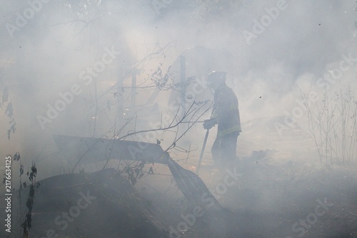 Firefighter in heavy smoke