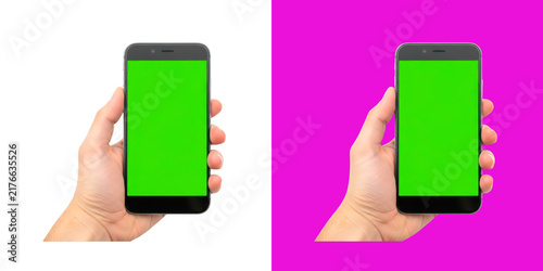 Fotografie Hand holding smartphone with green screen display chroma key concept transparent
