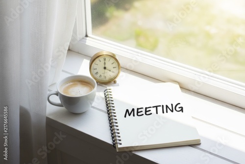 Handwritten Note PRIORITY on Bright Desk