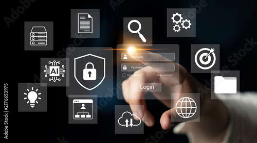 Photography A close-up image of a finger poised to select a data security icon on a digital interface, representing modern technology and data protection in business