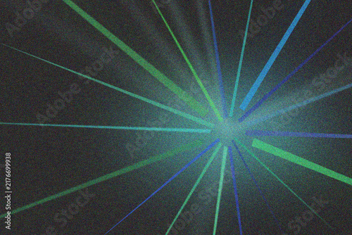 Dynamic digital starburst composition with blue green light rays on dark textured backdrop.
