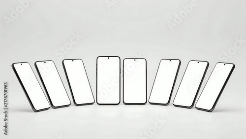 Row of modern blank screen smartphones on a white background