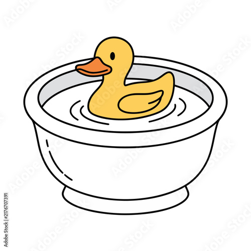 Yellow rubber duck in a bathtub