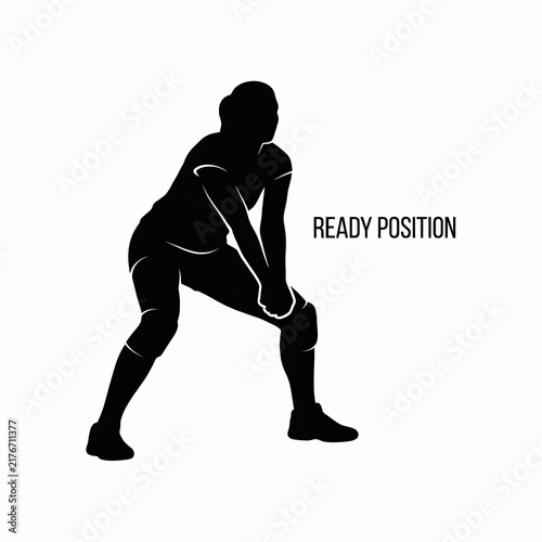 Volleyball player in ready defensive position silhouette