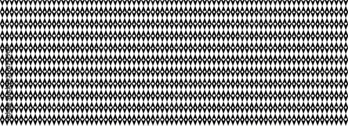 black-and-white geometric harlequin pattern features repeating vertical diamonds containing tiny playing card suit symbols, including spades, hearts, diamonds, and clubs.