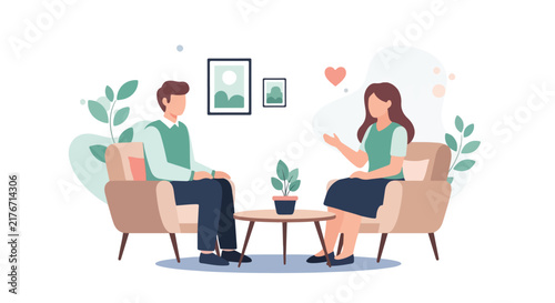 A man and a woman sit in cozy armchairs facing each other to have a warm conversation in a modern living space.