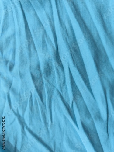 Fotografía Close-up of blue knit fabric with subtle folds