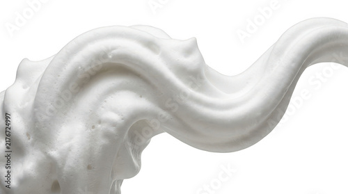 Closeup of a swirl of white shaving cream or whipped cream texture isolated on transparent background
