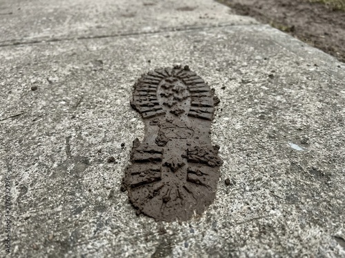 Muddy Boot Print On Concrete Path Detailed Outdoor Texture