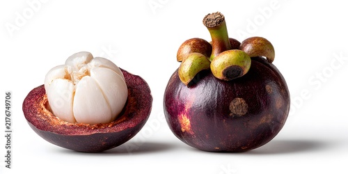 Fresh whole mangosteen fruit next to a cut half revealing white juicy flesh isolated on white background