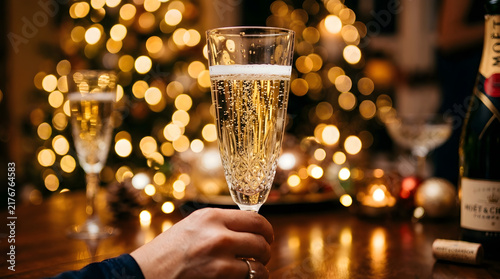 Golden Champagne Bubbles Rising with Glowing Bokeh Lights Celebration Background