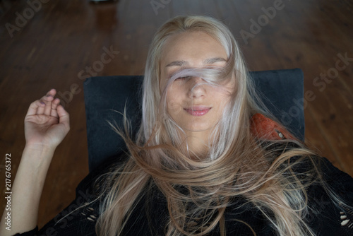 Portrait of a beautiful young woman in a studio.