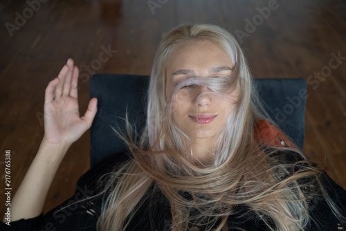 Portrait of a beautiful young woman in a studio.