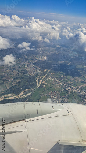 Flying an airplane above the clouds