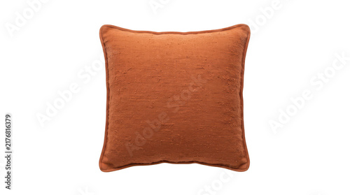 A square decorative throw pillow with a textured, burnt orange fabric cover and piped edges, isolated on transparent background
