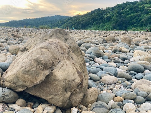 Prominent Boulder in Rocky Riverbed Landscape at Jaflong