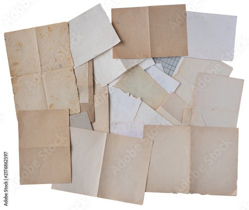 Flatlay top view collection of aged blank paper sheets textures and vintage documents on white