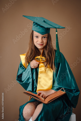 Fotografía Young girl exploring book searching knowledge