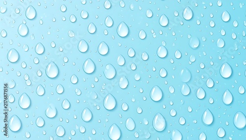 Bubbles floating in clear blue water background.
