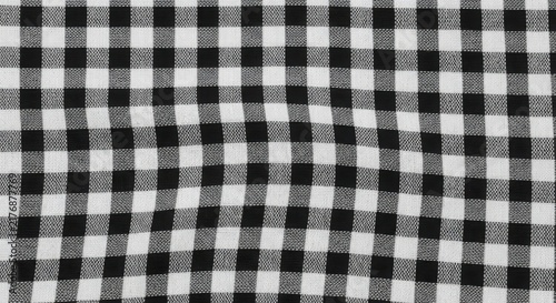 A black and white checkered pattern on a fabric illustration