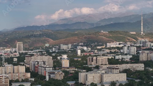  A picturesque drone view of the Kazakh city of Almaty at sunset on a summer evening.