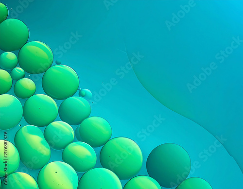 Abstract 3D geometric design with smooth green and lime spheres on a soft blue background. Minimalist futuristic wallpaper