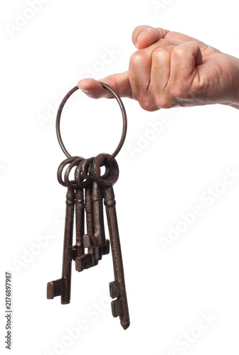 Old Rusty Keys In Hand Isolated