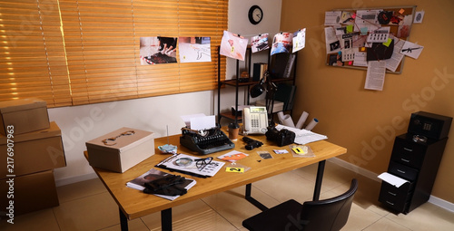 Fotografía Criminal investigation and detective work police office desk with evidence typew