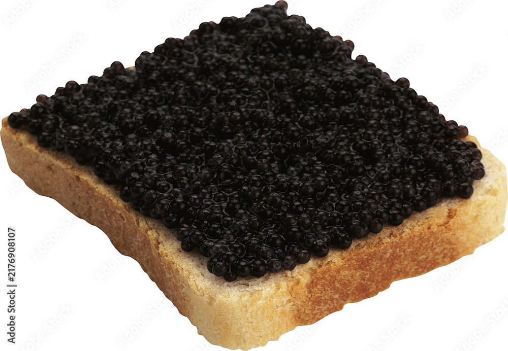 Obraz premium Luxurious black caviar served on a slice of artisan bread isolated on