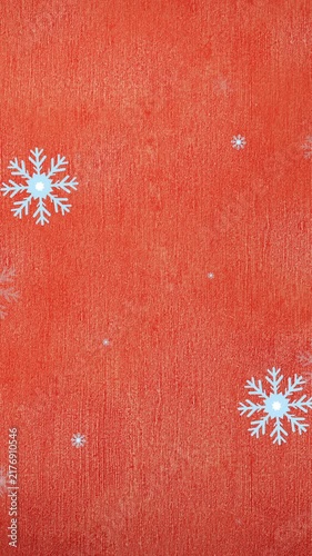 Animation of snowflakes falling over red background