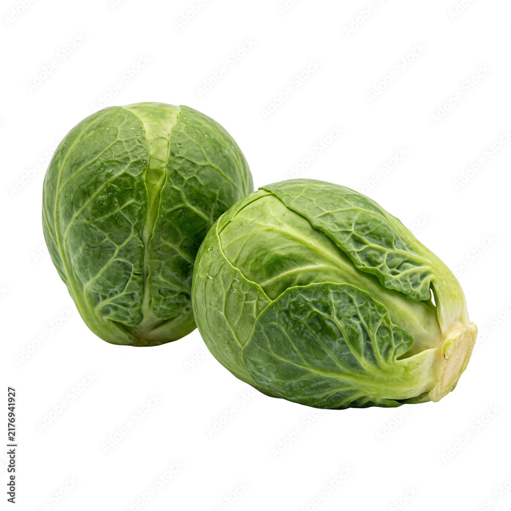 Obraz premium Two fresh Brussels sprouts isolated on black background, healthy food concept
