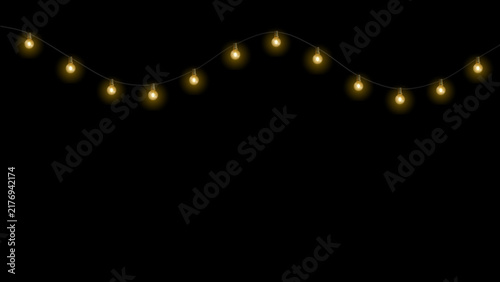 Glowing Christmas string lights garland isolated on black background