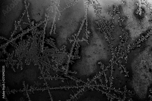 Cuadro en lienzo Christmas frost and ice crystals on frozen glass.