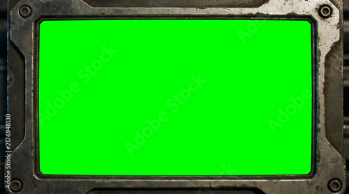 Futuristic Metal Monitor With Bright Green Screen Placeholder in Industrial Sci‑Fi Frame