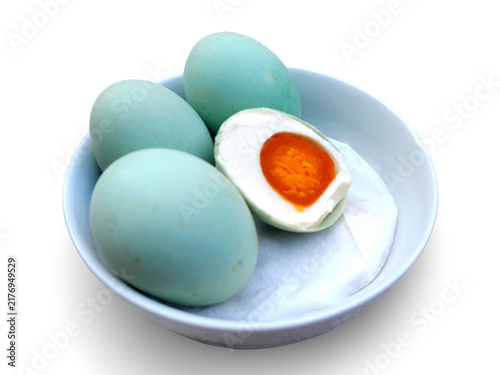 фотографія Salted eggs are duck eggs preserved with salt, resulting in distinctive blue-green shells and firm, oily yolks, with a savory and salty flavor that is their hallmark