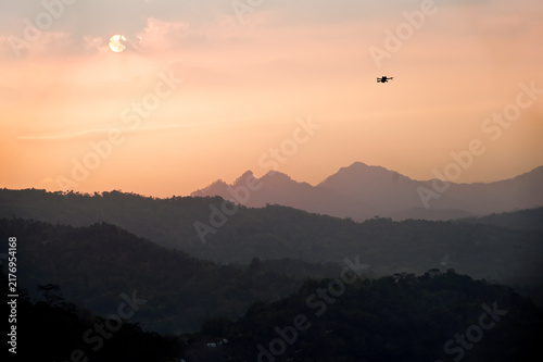 Photography Sunset over a mountainous landscape 'Java-Indonesia)
