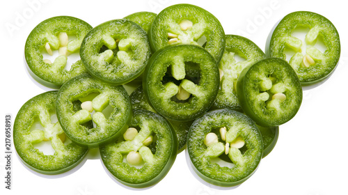 Fotografie Fresh sliced green jalapeno pepper rings with seeds