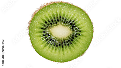 Fresh vibrant green kiwi fruit slice with black seeds and fuzzy brown skin